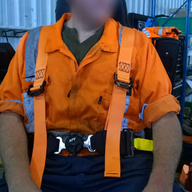 APV Easi-Grip 3 Point forestry and industrial harness in use on a seat, certified to SAEJ386, ISO6683, FMVSS302 standards.