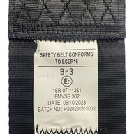 View of SA230 Black retractable lap seatbelt label showing seatbelt has been tested and certified to EU standard ECE R16 and FMVSS 302 safety compliance.